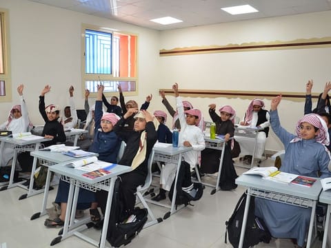 A classroom with a group of Saudi students with their teacher in a class, Saudi Arabia. In case the offence requires security intervention, the competent security agency would be summoned to the school, the report noted.