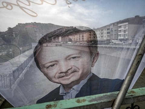 A flag of Turkish President Recep Tayyip Erdogan on a bridge above Coruh river at Bayburt city centre, north-east Turkey, on May 23, 2023.