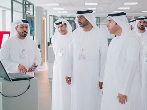 Interpol chief Maj Gen Dr Al Raisi (right) being briefed at SIRA in Dubai