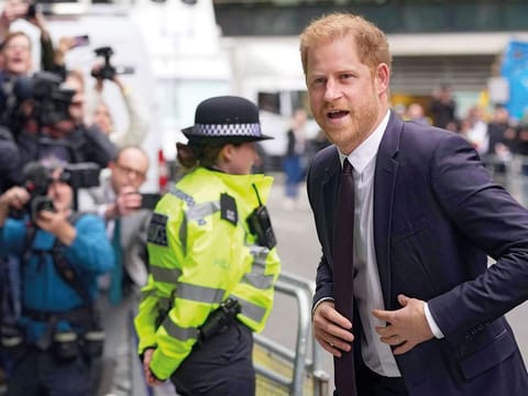 Prince Harry arrives at the High Court in London to testify against a tabloid publisher he accuses of phone hacking and other unlawful snooping.