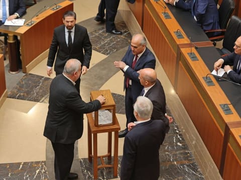 Lebanese MPs cast their vote during the 12th parliamentary session to elect a new president in the capital Beirut's downtown district on June 14, 2023.