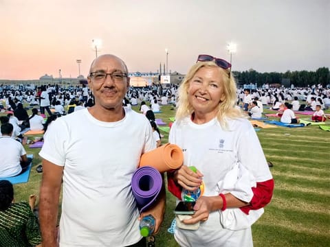 Khalid Ahmed Ali and Tatiana during the International Yoga Day celebrations in Sharjah on Sunday.