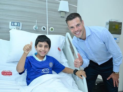 Khalifa Ali Salem Al Mansoori, with Chelsea jersey, meets his idol and Chelsea captain Cesar Azpilicueta in Abu Dhabi.