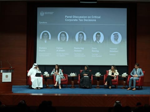 Ministry of Finance experts on tax policies, Shabana Begum, Executive Director of Tax Policy Sector; Fatima AlSheikh, Director of Tax Policies and Legislation; Rasha Hajj Hussein, Tax Policies and Legislation Expert; and Chris Searing, Tax Policy Sector Specialist, at a corporate tax awareness session in Sharjah.