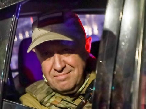 Yevgeny Prigozhin, the owner of the Wagner Group military company, looks out from a military vehicle on a street in Rostov-on-Don, Russia, Saturday, June 24, 2023, leaving an area of the headquarters of the Southern Military District.