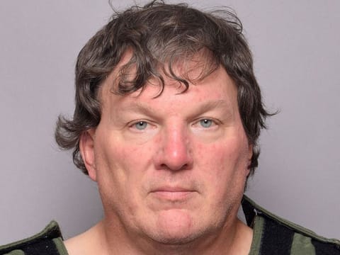 Rex A. Heuermann, an architect in his late 50s who lived a 20-minute drive from Gilgo Beach in Massapequa Park, appears in a jail booking photo provided by the Suffolk County Sheriff’s Office in Yaphank, New York, U.S. July 14, 2023.