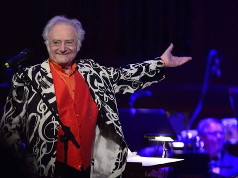 American-born conductor and composer Carl Davis thanks spectators during the Hollywood Night, the last concert of Prague Proms music festival in Prague, Czech Republic, on July 19, 2015.