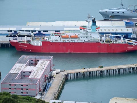 The Bibby Stockholm accommodation barge is pictured moored to the quayside at Portland Port in Portland, on the south-west coast of England on August 8, 2023.