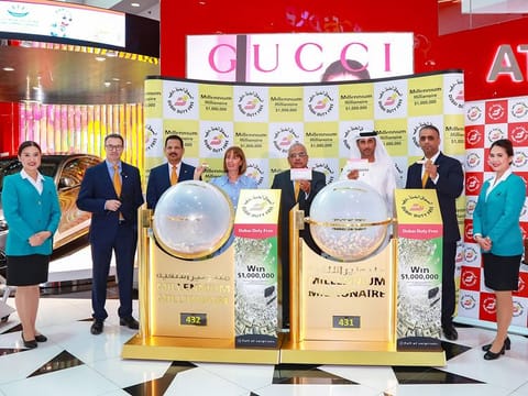 DDF representatives with the winning tickets at Concourse D of the airport on Wednesday