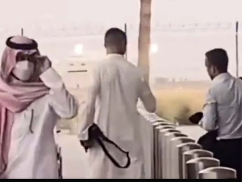 Ronaldo (centre) in a ‘Kandoura'
