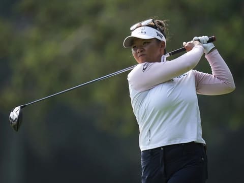 Megan Khang, of the USA, watches her tee shot on the seventh hole during the final round of the CPKC Women’s Open golf tournament on Sunday Aug 27, 2023, in Vancouver, British Colombia