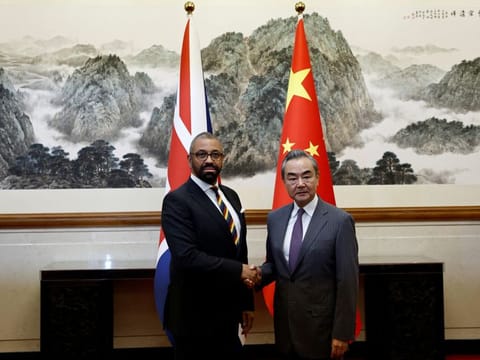 British Foreign Secretary James Cleverly with Chinese Foreign Minister Wang Yi at the Diaoyutai State Guesthouse in Beijing on August 30, 2023.