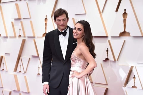 Ashton Kutcher and Mila Kunis at the Oscars on March 27, 2022, at the Dolby Theatre in Los Angeles.