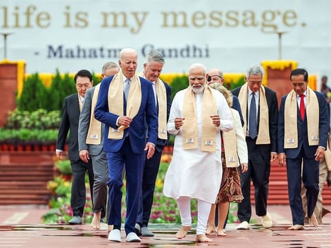 Indian Prime Minister Narendra Modi with US President Joe Biden and G20 leaders at Rajghat to pay homage to Mahatma Gandhi, in New Delhi on Sunday