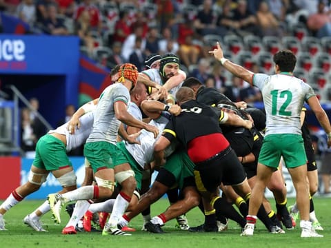 Wales and Portugal players fight it out during the Pool C match in Nice, France on Saturday.
