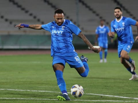 Hilal's Brazilian forward Neymar shoots to score his team's second goal during the AFC Champions League Group D match against Irans Nassaji Mazandaran at the Azadi Stadium in Tehran on Tuesday.
