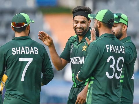 Pakistan's Haris Rauf (C) celebrates with teammates after taking the wicket of Australia's Steven Smith during a warm-up match ahead of the ICC men’s cricket World Cup, at the Rajiv Gandhi International Cricket Stadium in Hyderabad on October 3, 2023.