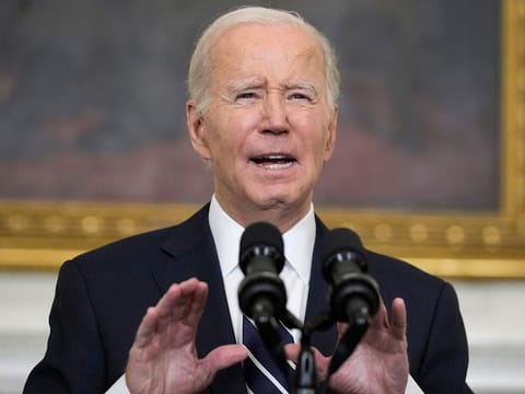 US President Joe Biden makes remarks after speaking by phone with Israeli Prime Minister Benjamin Netanyahu about the situation in Israel following Hamas' deadly attacks, from the State Dining Room at the White House in Washington, on October 10, 2023.