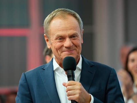 Donald Tusk, a former Polish prime minister addresses supporters at his party headquarters in Warsaw, Poland, Sunday, Oct. 15, 2023.