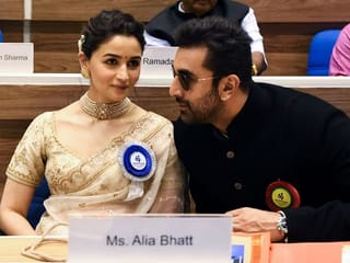 Bollywood actress Alia Bhatt receives Best Actress Award in her wedding saree