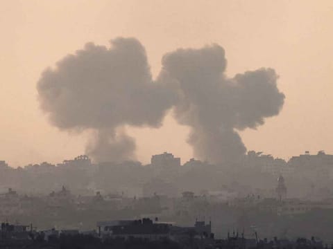 A picture taken from Israel's southern city of Sderot shows smoke billowing during an Israeli strike on Gaza on October 22, 2023.