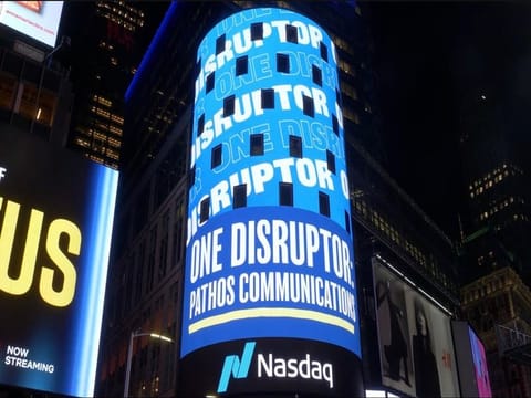 The Nasdaq Tower feature is a testament to Pathos Communications’ growth, innovation, and the increasing recognition of its unique business approach