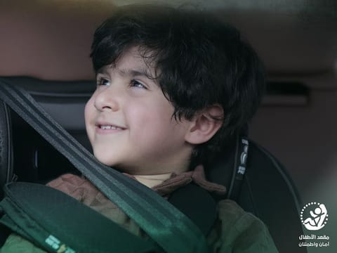 Allowing a child under the age of 10 or shorter than 145cm to sit in the front seat is punishable by a Dh400 fine. Seen here is a promotional image used in the police campaign.