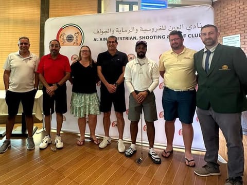 Winners at Al Ain Equestrian, Shooting and Golf Club alongside Men's Captain Wayne O'Mahony