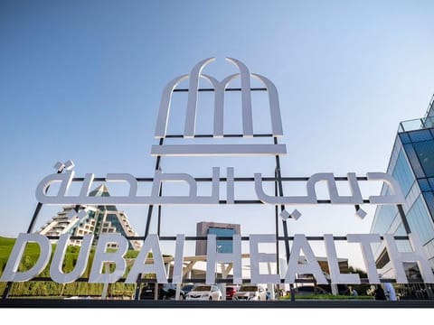 The logo features three arches anchored by a foundation