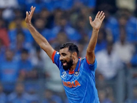 India's Mohammed Shami celebrates a New Zealand dismissal during the ICC Men's Cricket World Cup semifinal at the Wankhede Stadium in Mumbai, India, on November 16, 2023. His haul of 7-57 helped India enter the final.
