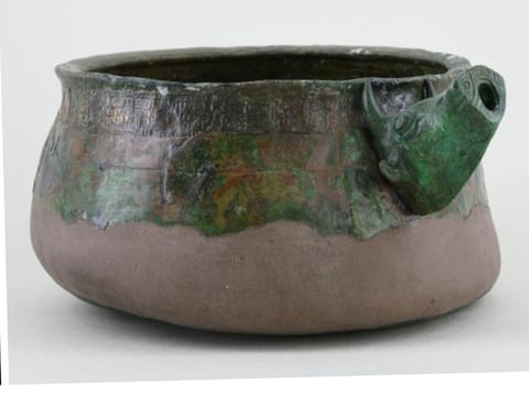 A bronze bowl featuring a mix of Hellenistic, African and Arabian iconography including Alexander the Great and an Arabian man fighting a lion with a camel lying behind, provide further evidence for the reach of trade systems during this period.
