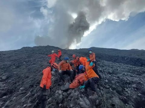 Rescuers searching the hazardous slopes of Indonesia's Marapi volcano found more bodies among the climbers caught by a surprise eruption.