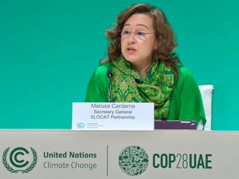 Maruxa Cardama, SLOCAT Secretary General, talks during talk on green transport at COP28