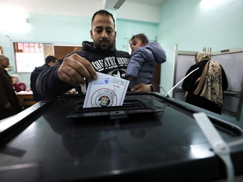 Voting underway at a polling station during the first day of the presidential election in Cairo on December 10, 2023.
