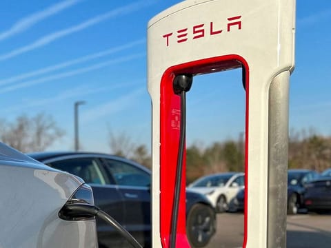 Tesla Supercharger station at a Tesla store in Ann Arbor, Michigan, U.S., December 7, 2023.