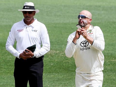 Australia's Nathan Lyon bowls during day three of the first Test cricket match against Pakistan in Perth on December 16, 2023.