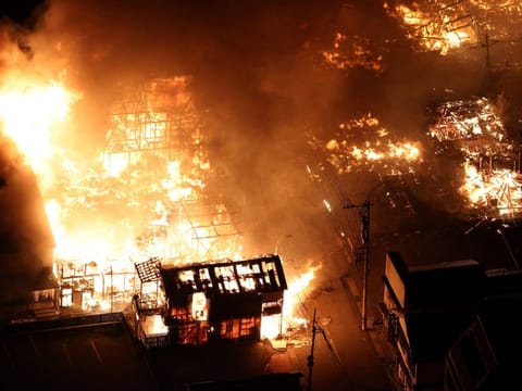 This aerial photo shows buildings burning in the city of Wajima, Ishikawa prefecture on January 1, 2024, after a major 7.5 magnitude earthquake struck the Noto region in Ishikawa prefecture in the afternoon.