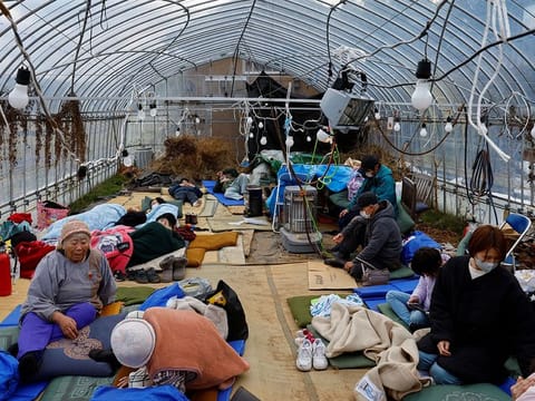 Evacuated people rest at a green house converted as an evacuation center, in the aftermath of an earthquake, in Wajima, Ishikawa prefecture, Japan January 2, 2024