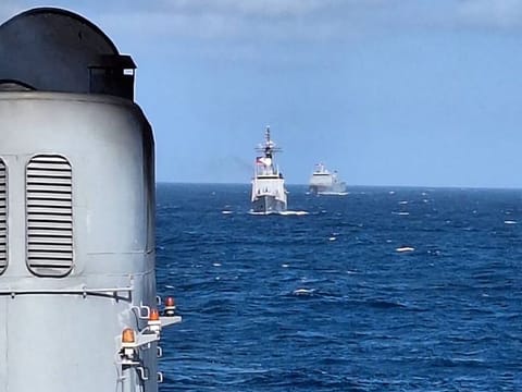 This handout photo from the Armed Forces of the Philippines taken on January 3, 2024 shows Philippine vessels in line formation during the second iteration of the Armed Forces of the Philippines and the US Indo-Pacific Command Military Cooperative Activity in the South China Sea.