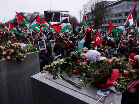 Pro-Palestinian protesters gather near the International Court of Justice (ICJ) as judges hear a request for emergency measures by South Africa to order Israel to stop its military actions in Gaza, in The Hague, Netherlands January 12, 2024
