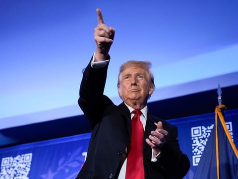 Republican presidential candidate former President Donald Trump gestures after speaking at a campaign event in Portsmouth, N.H., Wednesday, Jan. 17, 2024.