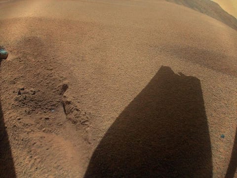 This NASA photo obtained on January 25, 2024 shows NASA's Ingenuity Mars Helicopter's rotor blade damaged during its Flight 72 landing.