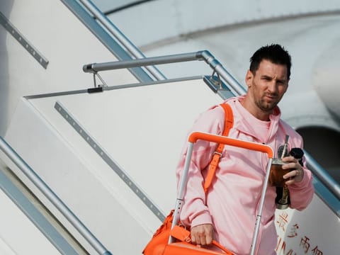 Inter Miami's Lionel Messi arrives at the Hong Kong International Airport for Inter Miami's first international tour in Hong Kong on Friday.