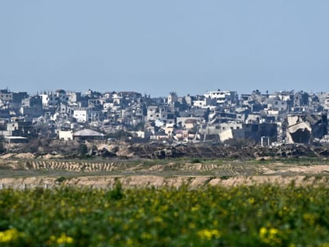 Israeli tanks manoeuvre inside Gaza as buildings lie in ruin on February 4, 2024.