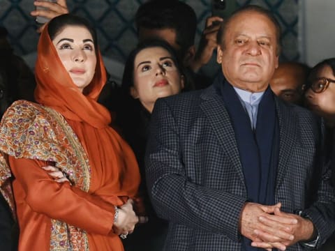 Pakistan's former Prime Minister Nawaz Sharif and leader of the Pakistan Muslim League (PML) party, next to his daughter Maryam Nawaz, attend a gathering with supporters a day after Pakistan's national elections, in Lahore on February 9, 2024.