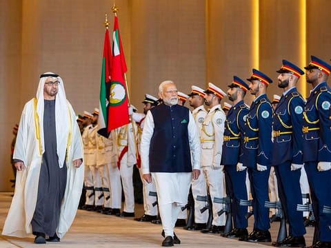 UAE President His Highness Sheikh Mohamed bin Zayed Al Nahyan and India PM Narendra Modi inspect the UAE Armed Forces honour guard during a reception at the Presidential Airport.
