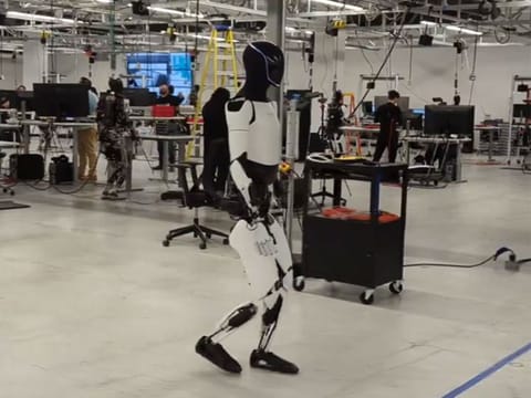 Optimus strolling around the lab.