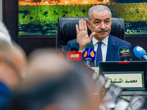 Palestinian Prime Minister Mohammad Shtayyeh chairs a cabinet meeting in the West Bank city of Ramallah before his government's resignation.