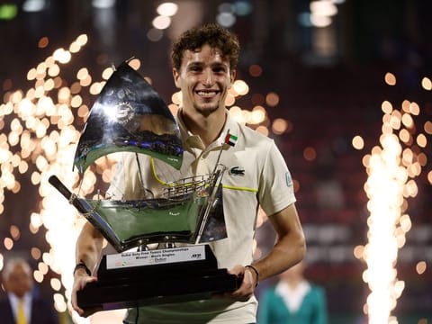 France's Ugo Humbert poses with the trophy after winning the final against Kazakhstan's Alexander Bublik in the Dubai Tennis Championships at Dubai Duty Free Tennis Stadium last year.
