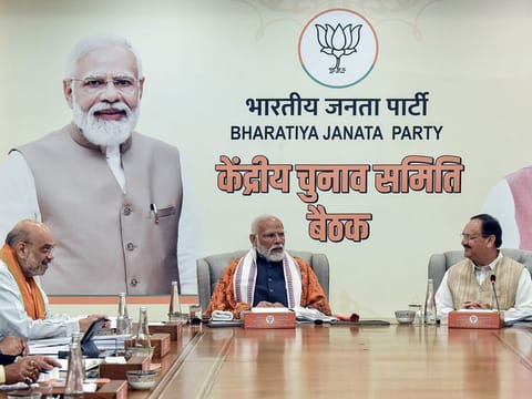 Prime Minister Narendra Modi with Union Home Minister Amit Shah and BJP National President JP Nadda